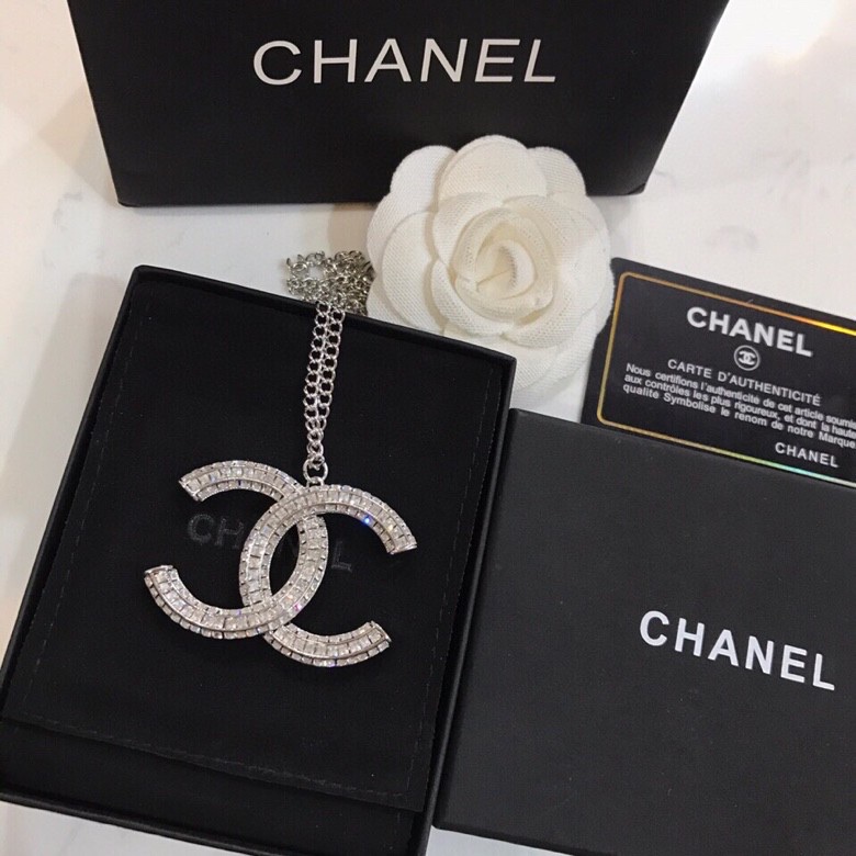 Ch*el brooches